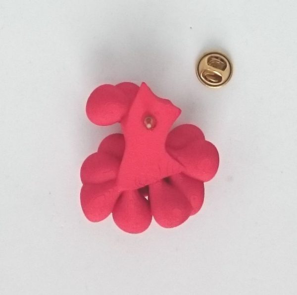 Bud Pin, new addition to Collection, designed by Ann Marie Shillito, 3D printed in polyamide and dyed festive red. Showing the back of the pin.