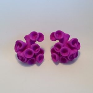 Bud Earrings by Ann Marie Shillito, 3D printed in polyamide and dyed in purple.